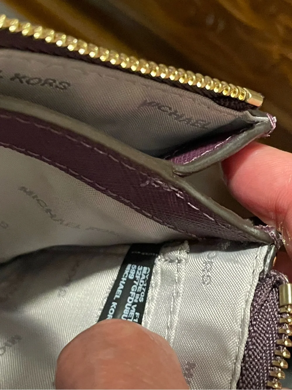 MICHAEL KORS  Brooklyn Plum Wristlet with Gold Eyelet Detail